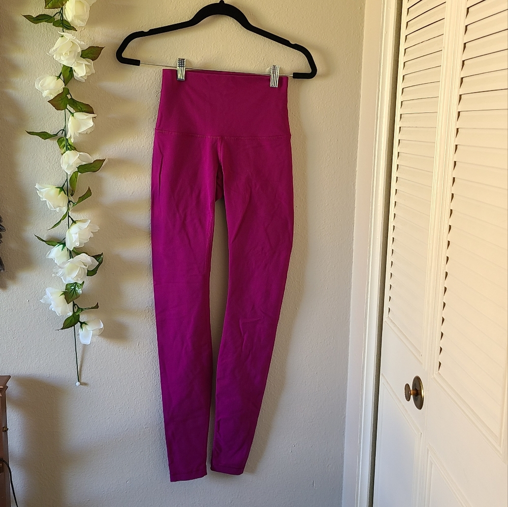 Lululemon pink workout leggings size 4
